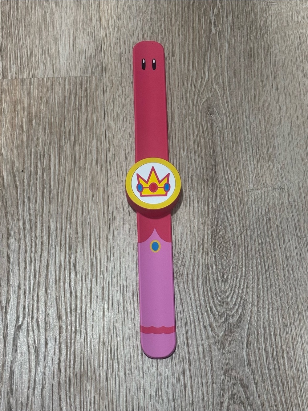 Pink Princess Peach Power Band Slap Bracelet Toy with Crown Emblem